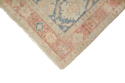 Backside of handmade New Sultanabad rug showing knot structure and weave density