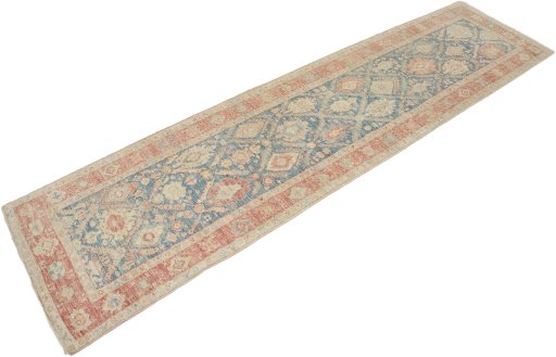 Corner detail of New Sultanabad rug showing border pattern and Wool pile