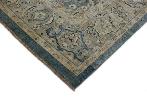 Backside of handmade New Sultanabad rug showing knot structure and weave density