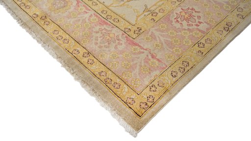 Backside of handmade New Sultanabad rug showing knot structure and weave density