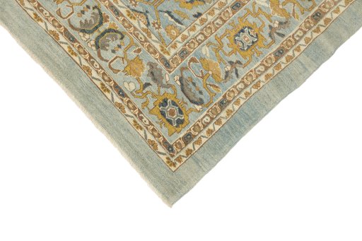 Backside of handmade New Sultanabad rug showing knot structure and weave density