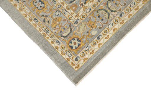 Backside of handmade New Sultanabad rug showing knot structure and weave density