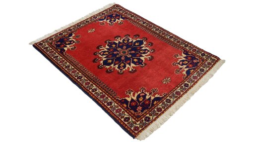 Corner detail of 1950s Tafresh rug showing border pattern and Wool pile