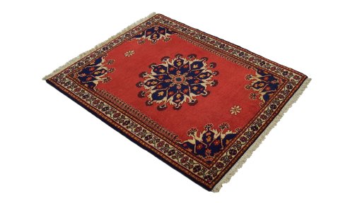 Corner detail of 1950s Tafresh rug showing border pattern and Wool pile