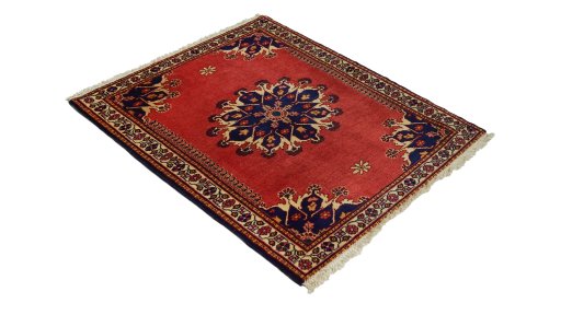 Close-up detail of 1950s Tafresh rug from Iran / Persia showing Wool weave