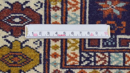 Backside of handmade 1960s Torkaman rug showing knot structure and weave density