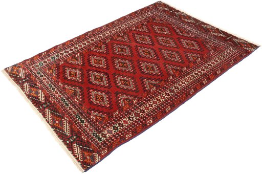 Corner detail of 1960s Torkaman rug showing border pattern and Wool pile