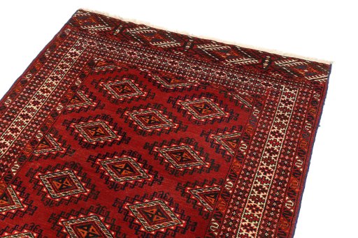 Surface texture of 1960s Torkaman rug with natural Wool and intricate pattern