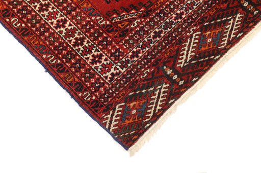 Backside of handmade 1960s Torkaman rug showing knot structure and weave density