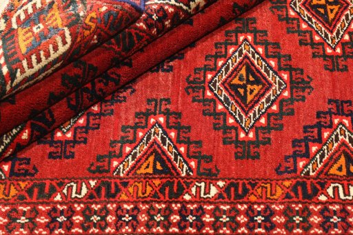 Close-up detail of 1960s Torkaman rug from Iran / Persia showing Wool weave