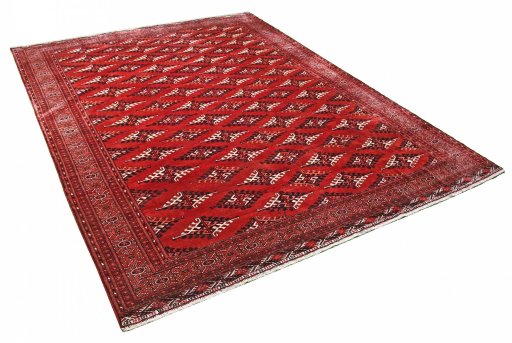 Corner detail of 2000s Torkaman rug showing border pattern and Wool pile