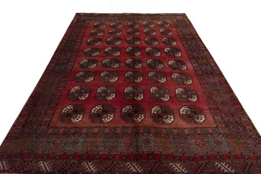 Surface texture of 2000s Torkaman rug with natural Wool and intricate pattern