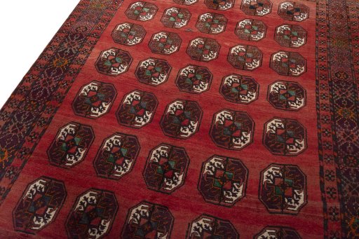 Backside of handmade 2000s Torkaman rug showing knot structure and weave density