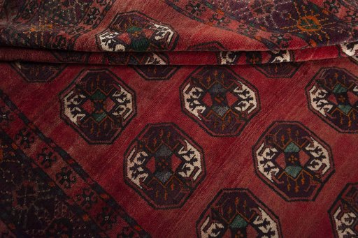 Full view of 2000s Torkaman rug from Iran / Persia, 280 × 188 cm in Red tones
