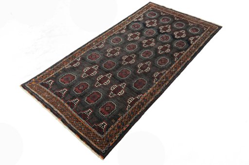 Corner detail of 2000s Torkaman rug showing border pattern and Wool pile