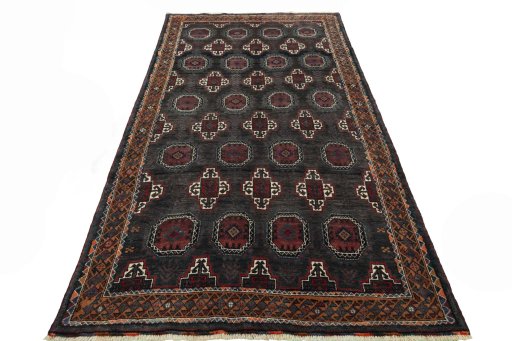 Surface texture of 2000s Torkaman rug with natural Wool and intricate pattern