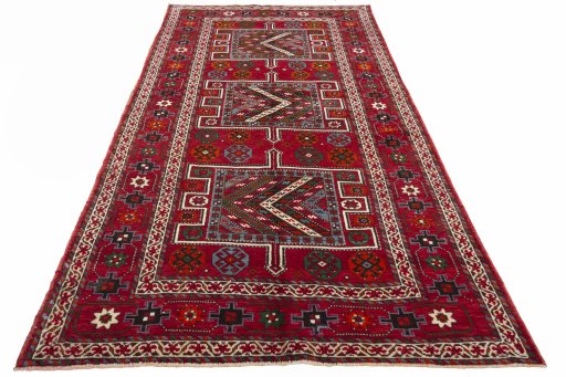 Surface texture of 2000s Torkaman rug with natural Wool and intricate pattern