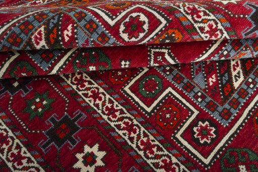 Full view of 2000s Torkaman rug from Iran / Persia, 284 × 149 cm in Red tones
