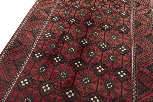 Backside of handmade 2000s Torkaman rug showing knot structure and weave density
