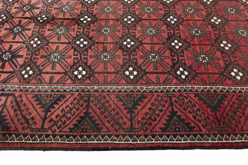 Close-up detail of 2000s Torkaman rug from Iran / Persia showing Wool weave
