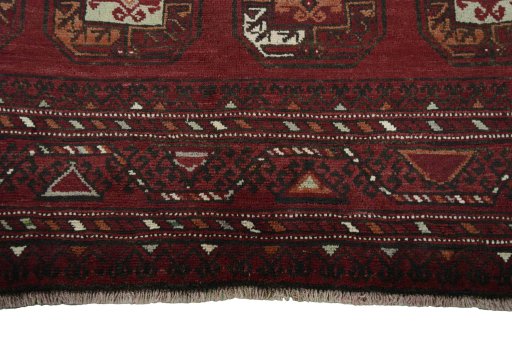 Backside of handmade 2000s Torkaman rug showing knot structure and weave density