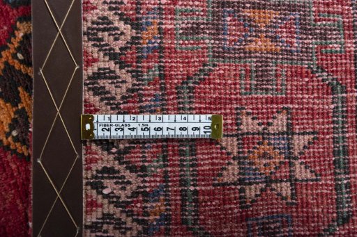 Corner detail of 1970s Torkaman rug showing border pattern and Wool pile