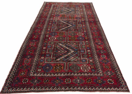 Surface texture of 1970s Torkaman rug with natural Wool and intricate pattern