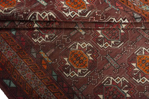 Full view of 2000s Torkaman rug from Iran / Persia, 293 × 158 cm in Red tones