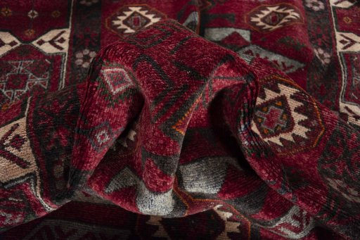Corner detail of 2000s Torkaman rug showing border pattern and Wool pile