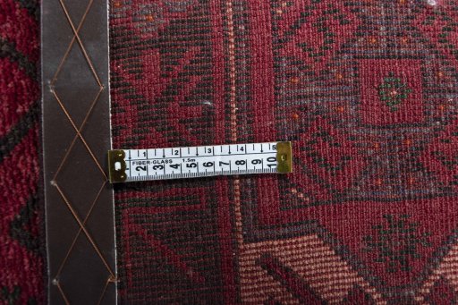 Close-up detail of 2000s Torkaman rug from Iran / Persia showing Wool weave