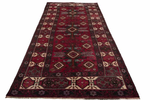 Surface texture of 2000s Torkaman rug with natural Wool and intricate pattern