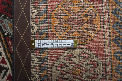 Close-up detail of 2000s Torkaman rug from Iran / Persia showing Wool weave