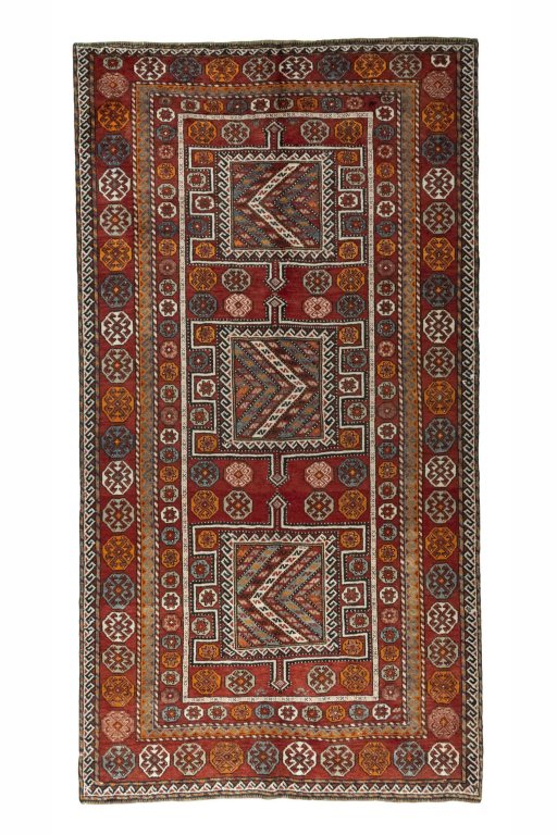 Full view of 2000s Torkaman rug from Iran / Persia, 297 × 159 cm in Red tones