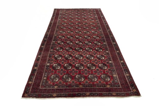 Surface texture of 1970s Torkaman rug with natural Wool and intricate pattern