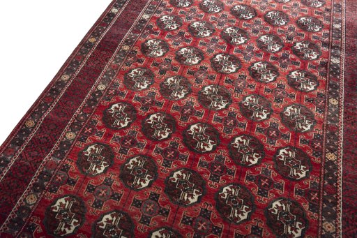 Backside of handmade 1970s Torkaman rug showing knot structure and weave density