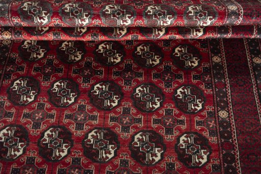 Full view of 1970s Torkaman rug from Iran / Persia, 295 × 140 cm in Red tones