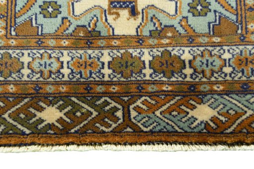 Close-up detail of 2000s Torkaman rug from Iran / Persia showing Wool weave