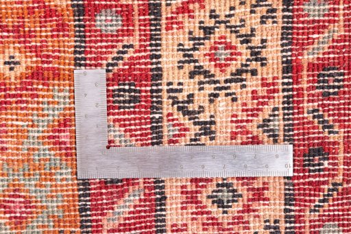 Corner detail of 1995s Torkaman rug showing border pattern and Wool pile
