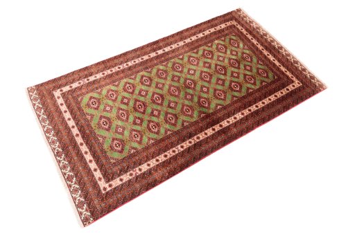 Close-up detail of 1995s Torkaman rug from Iran / Persia showing Wool weave