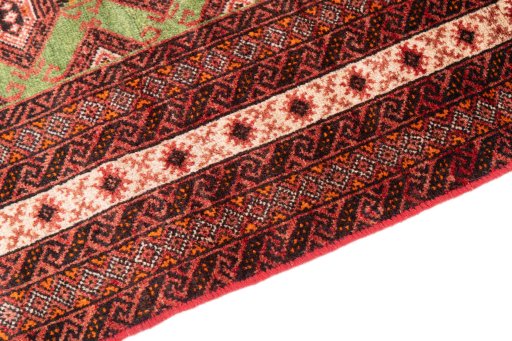 Backside of handmade 1995s Torkaman rug showing knot structure and weave density