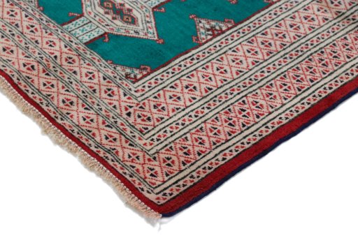 Backside of handmade New Torkaman rug showing knot structure and weave density