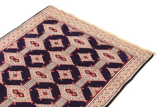 Surface texture of 1990s Torkaman rug with natural Wool and intricate pattern