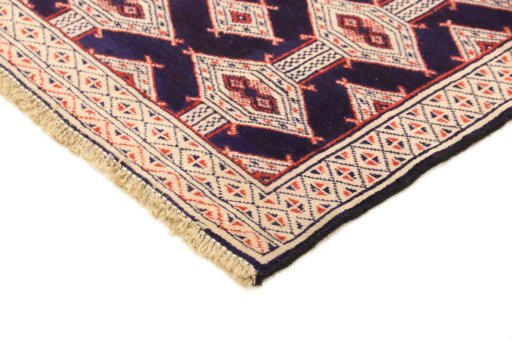 Backside of handmade 1990s Torkaman rug showing knot structure and weave density
