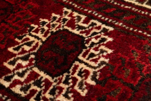 Surface texture of 2017s Torkaman rug with natural Wool and intricate pattern