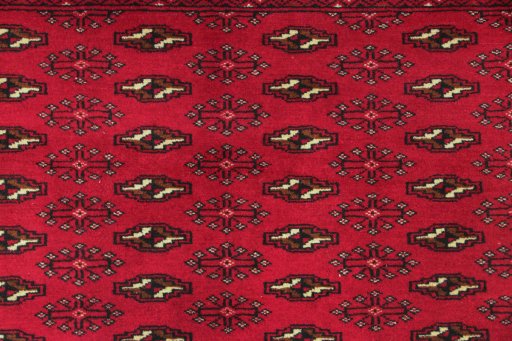 Close-up detail of 2000s Torkaman rug from Iran / Persia showing Wool weave