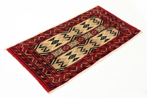 Close-up detail of 2000s Torkaman rug from Iran / Persia showing Wool weave
