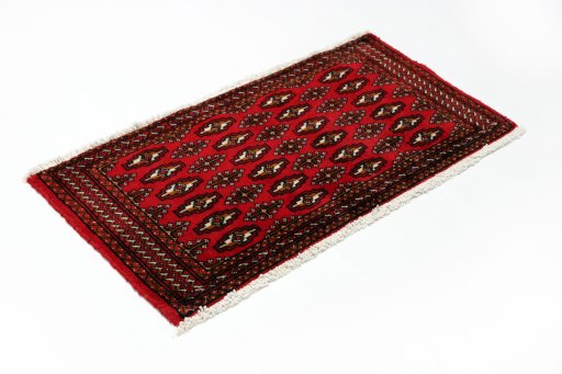 Close-up detail of 2000s Torkaman rug from Iran / Persia showing Wool weave