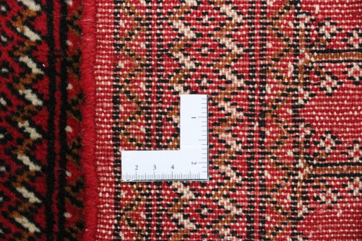 Close-up detail of 2000s Torkaman rug from Iran / Persia showing Wool weave