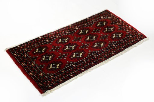 Close-up detail of 2000s Torkaman rug from Iran / Persia showing Wool weave