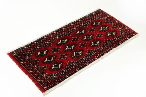 Close-up detail of 2000s Torkaman rug from Iran / Persia showing Wool weave